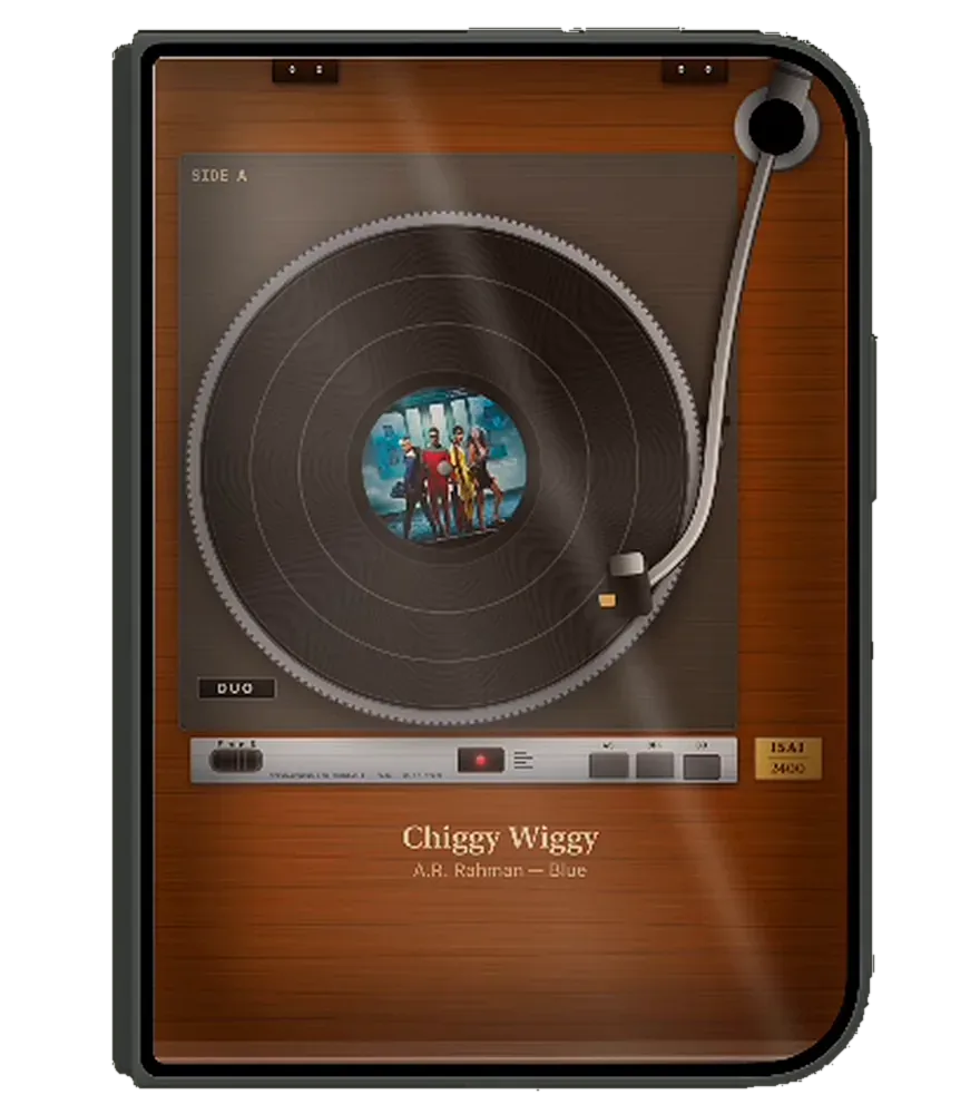 The 2400 turntable in walnut with a chrome tonearm, playing Chiggy Wiggy